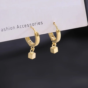 Boucles d'oreilles pendantes géométriques dorées en acier titane poli pour femmes