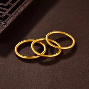 Set of three matte gold solid rings with minimalist stackable design in oriental style