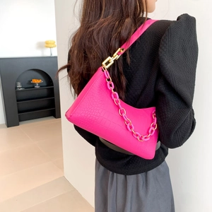 Pink faux crocodile leather underarm bag with decorative chain strap for women