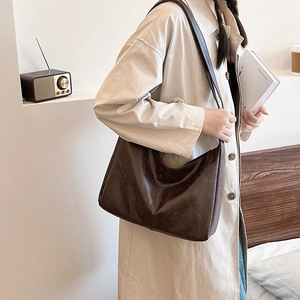 Retro dark brown hobo shoulder bag in polished faux leather for stylish daily commuting