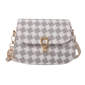 Retro houndstooth saddle bag with gold horsebit buckle and adjustable shoulder strap