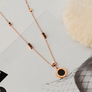 Rose gold stainless steel love necklace with double-sided round black geometric pendant