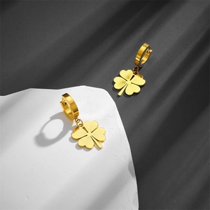 Minimalist gold clover drop earrings with brushed metal texture and hoop closures