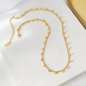 Collier ras du cou élégant en or 18K avec de petites perles rondes polies pour femme