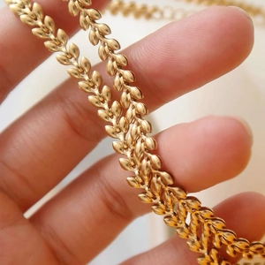 Golden wheat leaf necklace in stainless steel with a minimalist choker design for women