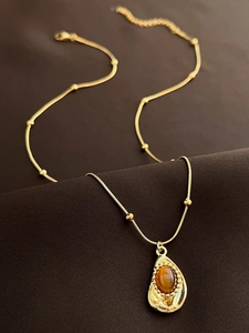 Collier doré en acier titane avec pendentif œil de tigre en forme de goutte