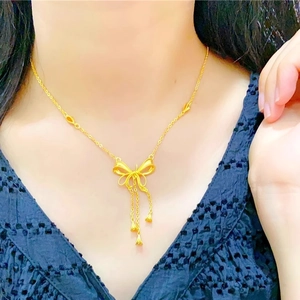 Collier Élégant En Cuivre Plaqué Or Avec Pendentif Nœud Et Pompons Pour Femmes Bijoux À Longues Franges Mode Cadeau