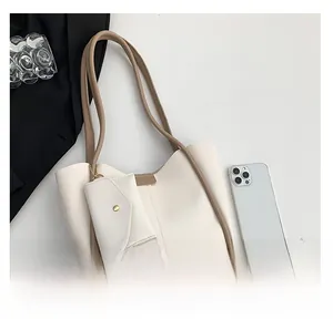 Detailed size comparison of beige tote bag set with khaki trim and smartphone