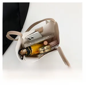 Top view of cream tote bag showing spacious interior and daily essentials capacity