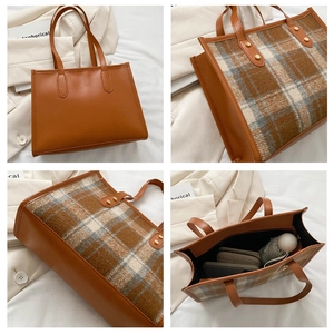 Details der karierten Woll-Tote-Bag mit Leder-Patchwork und geräumigem Innenraum
