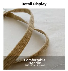 Close-up of the comfortable corduroy handle with detailed striped texture in beige