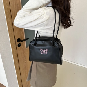 Minimalist black leather shoulder bag with pink butterfly embroidery for women
