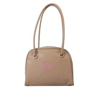 Minimalist beige shell shoulder bag with pink butterfly embroidery on a white background
