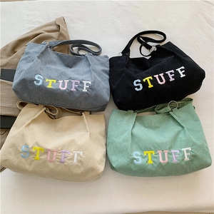 Corduroy tote bags with STUFF embroidery in dark grey, black, beige and green