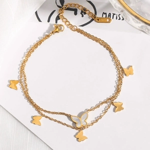 Bracelet de cheville double couche en acier doré avec papillon en nacre élégant
