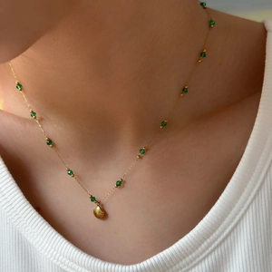 Retro emerald bead necklace with gold shell pendant on titanium steel chain