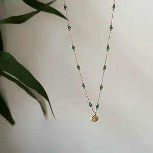 Retro emerald beaded necklace with golden shell pendant in durable titanium steel