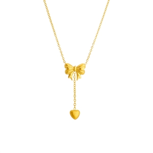 Elegant titanium steel gold bow and heart tassel necklace with a delicate finish