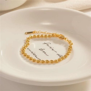 Elegant gold heart-link chain bracelet for women featuring adjustable lobster clasp