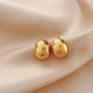 Boucles d'oreilles boules dorées polies sur soie, bijoux minimalistes en titane