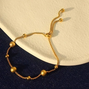 Adjustable 18K gold plated titanium steel bead bracelet with frosted beads finish