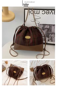 Detail of coffee plaid wool bucket bag with leather drawstring and gold chain strap