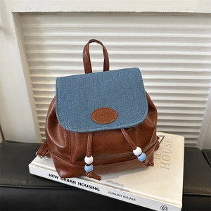 Vintage mini backpack in brown PU leather and denim blue patchwork with drawstring closure