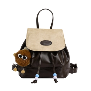 Vintage style brown and beige PU leather mini backpack with plush monster pendant charm