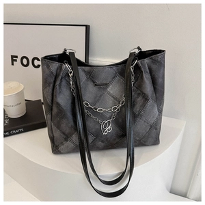 Vintage denim tote bag with diamond stitching and decorative silver double chains