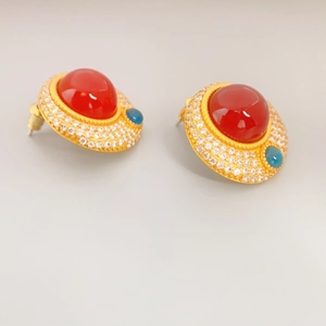 Retro round gold stud earrings with large red agate center and pave cubic zirconia stones