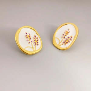 Vintage lavender enamel oval stud earrings in gold-tone metal with floral pattern