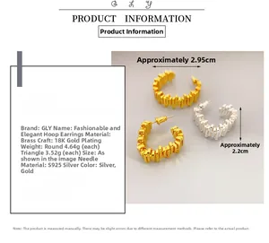 Detailed view of C-shaped textured gold and silver earrings with S925 silver needles