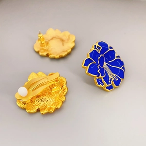 Vintage floral stud earrings and clips with blue enamel and gold-plated finish