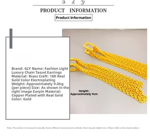 Detail view of gold-plated tassel chain earrings with dimensions and 18K gold finish info