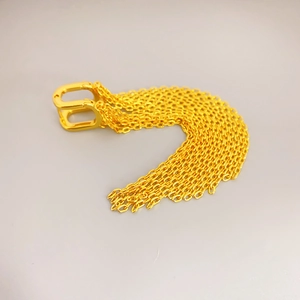U-shaped gold chain tassel earrings in a vintage palace style with multi-row link design
