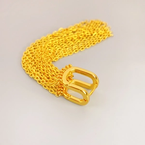 Elegant gold-plated U-shaped ear cuffs with multiple tassel chains in a luxury style