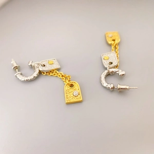French vintage rectangular embossed earrings in gold and silver mixed tones with crystals