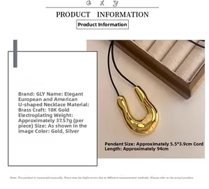 Macro detail of 18K gold-plated irregular U-shape pendant with dimensions and specifications