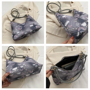 Detailed four-way view showing the colorful cartoon patterns and spacious interior of the bag