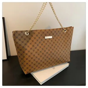 Classic brown floral tote bag with diamond lattice pattern and gold chain handles