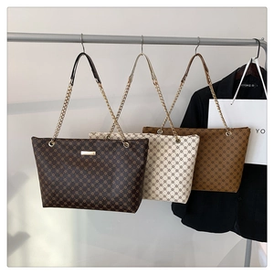 Three retro geometric pattern tote bags with gold chain straps in coffee, beige and khaki