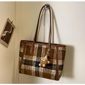 Retro plaid wool tote bag in brown with leather straps and plush toy charm
