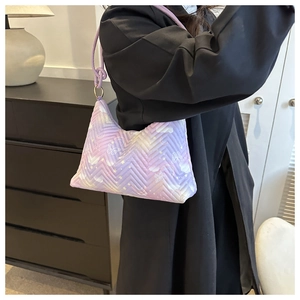 Quilted purple nylon shoulder bag with butterfly print and crescent moon patterns