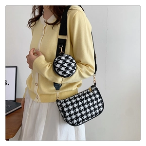 Minimalist houndstooth plaid crossbody bag set with wide black strap on model