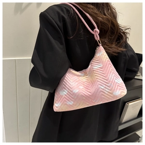Pink quilted nylon shoulder bag with butterfly prints and knotted strap detail