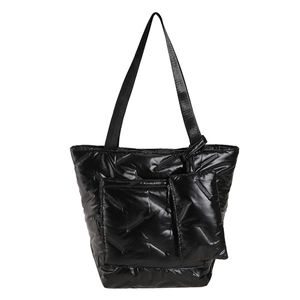 Glossy black quilted puffer bucket bag for women with matching mini zipper pouch