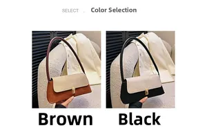 Detail of color-block shoulder bag featuring metal buckle and matte texture in brown and black