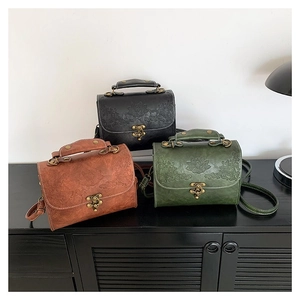 Vintage embossed lotus crossbody bag in black, brown, and green with antique bronze hardware