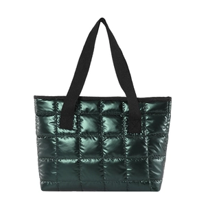 Quilted green puffer tote bag with metallic gloss finish and wide black straps