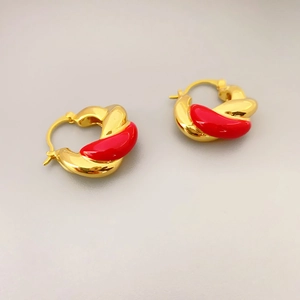 Double strand spiral hoop earrings in gold plating and vibrant red enamel glaze